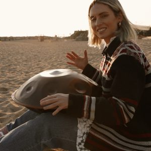 woman handpan beach